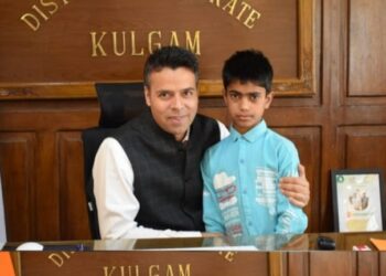 DC Kulgam felicitates Momin Ishaq, a young Innovator
