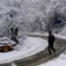 Snowfall, rain brings temperature drop in Kashmir, authorities close several roads